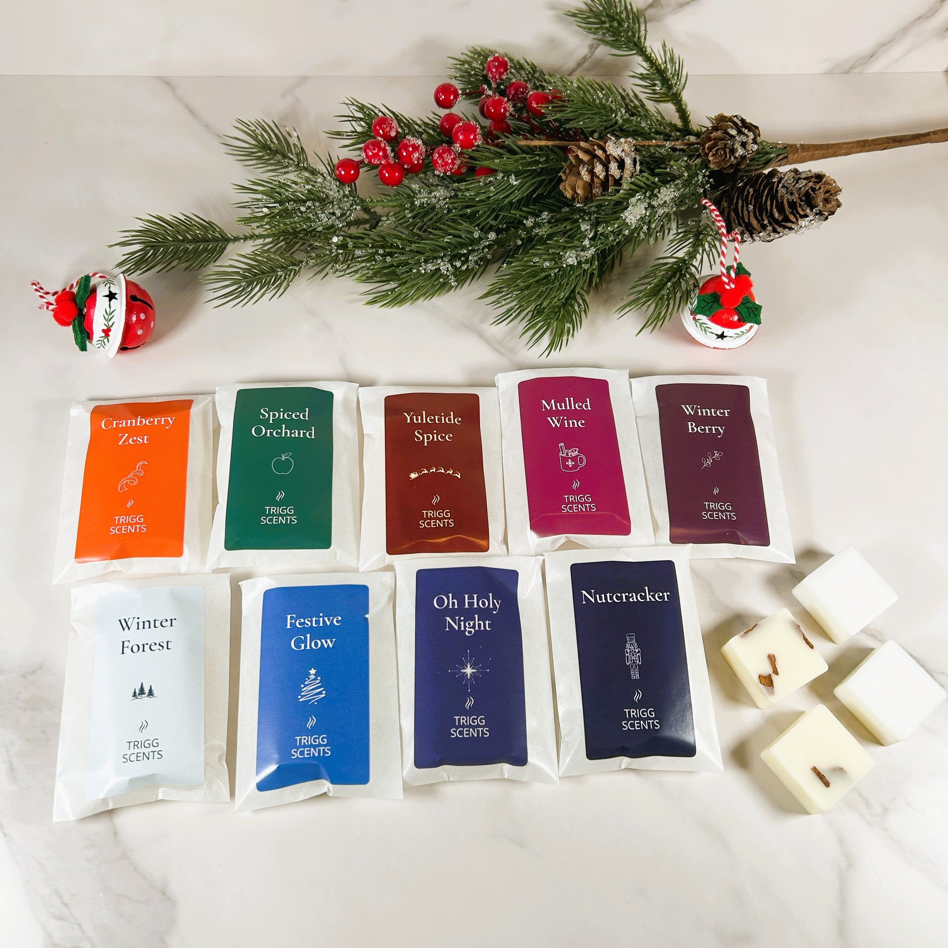 TRIGG SCENTS 9 Christmas luxury wax melt selection gift set with festive fragrances Cranberry Zest, Yuletide Spice, and Winter Forest.