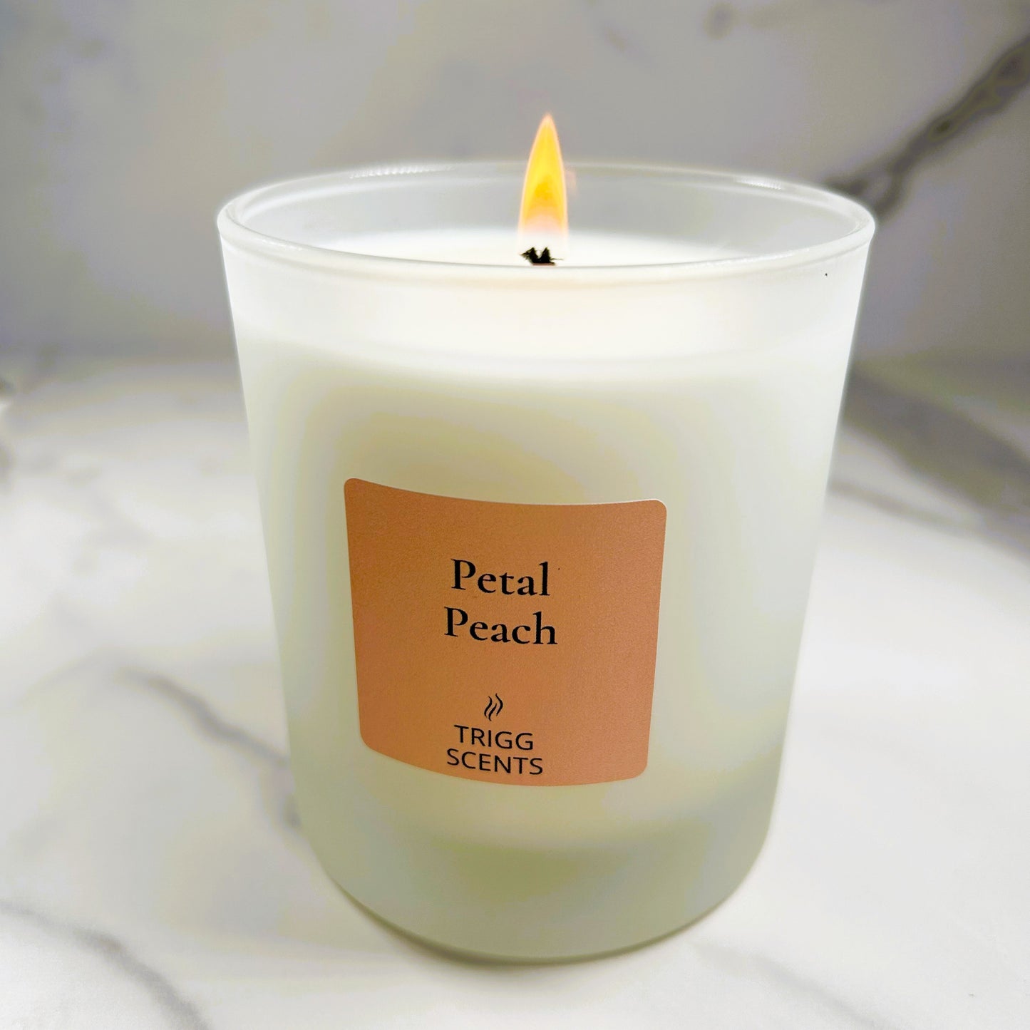 Petal Peach luxury candle by TRIGG SCENTS with soft peach and floral fragrance notes